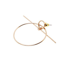 fine gold earrings with circle and line side view edgability