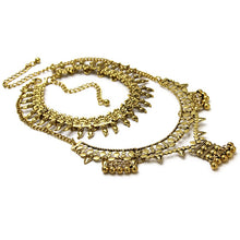 layered boho yellow gold necklace angle view edgability