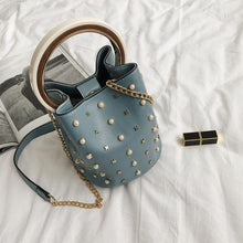 studded bag bucket bag blue bag edgability top view