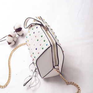 hexagonal studded white bag angle view edgability