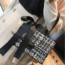 black and white tweed bag sling bag with bow edgability model view