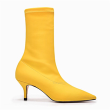 yellow boots with kitten heels edgability side view