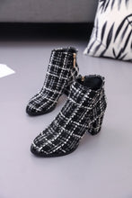 tweed boots ankle boots white and black boots edgability front view
