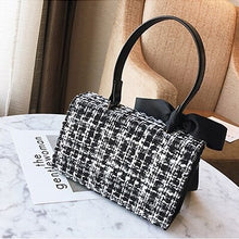 black and white tweed bag sling bag with bow edgability back view