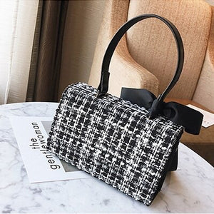 black and white tweed bag sling bag with bow edgability back view
