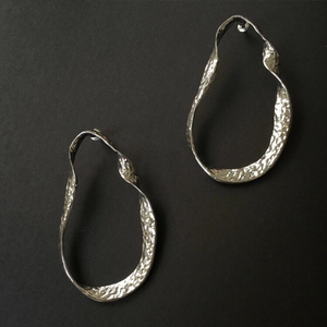 curved silver earrings silver jewelry edgability