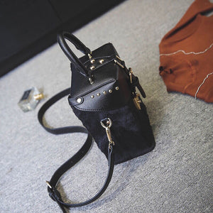 fur box bag in black sling bag edgability side view