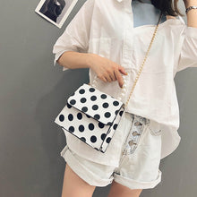 polka dots bag black and white bag pearls bag edgability model view