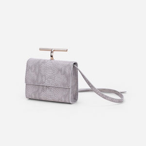 grey snakeskin clutch bag with gold handle edgability angle view