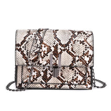 affordable brown beige snakeskin sling bag edgability front view