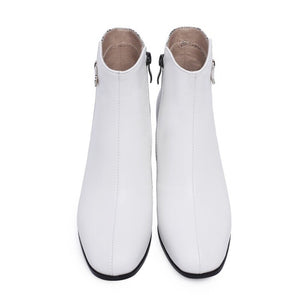 trendy boots ankle boots snakeskin boots with block heels edgability front view