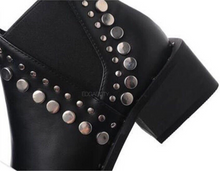black ankle booties with rivets edgability detail view