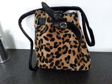 bucket bag drawstring bag sling bag leopard bag edgability front view