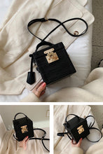classy leather black box bag edgy fashion edgability angle view
