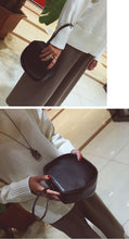 black bag box bag round bag wristlet edgability detail view