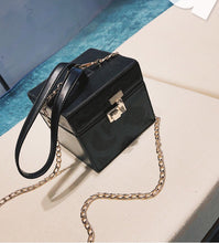 black bag box bag vintage bag edgability top view