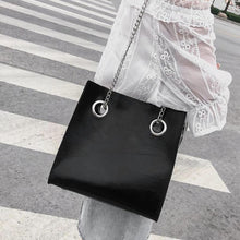 black bag sling bag edgy fashion edgability model view