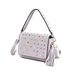 multicoloured studded white bag with tassles angle view edgability