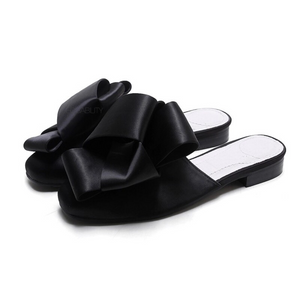 classy bow black flats angle view edgability