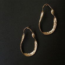 curved gold earrings gold jewelry edgability