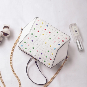 hexagonal studded white bag top view edgability