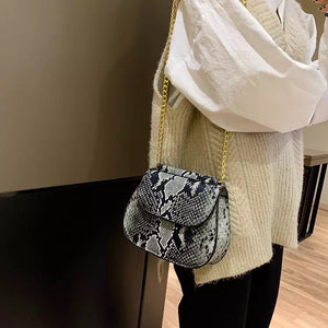 classy grey snakeskin black bag edgy fashion edgability model view