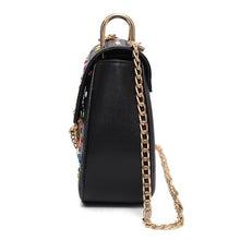 multicoloured studded bag black bag edgability side view