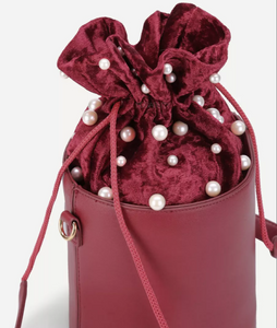 pearl studded bucket bag edgability top view