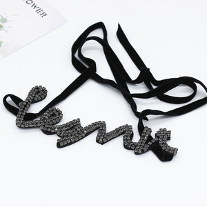 trendy black silver crystal cursive choker edgability top view