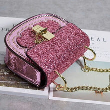 sparkly pink party handbag angle view edgability