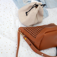 brown handbag bucket bag edgability bottom view