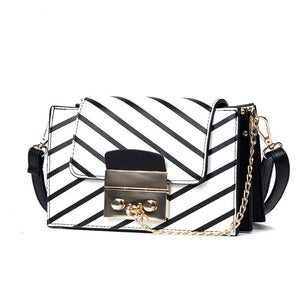 black stripes on white handbag angle view edgability