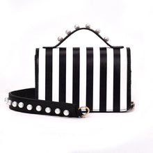 striped black bag studded bag edgability