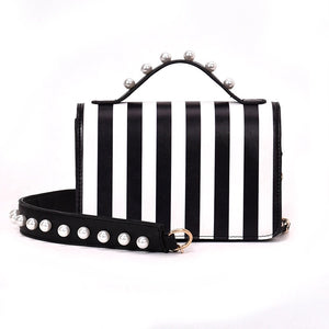 striped black bag studded bag edgability