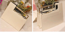 geometric classy white bag with gold handle edgability detail view