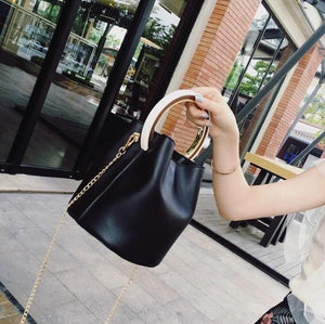 black bag bucket bag luxury bag wristlet edgability size view