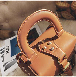 brown plaid bag studded bag box bag edgability top view