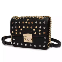 silver gold studded bag black bag edgability angle view