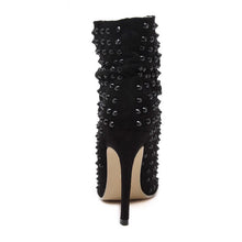 black boots studded boots peeptoe boots edgability back view
