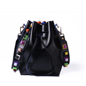 multicoloured studs strap black bucket bag edgability