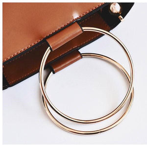 brown bucket bag with ring handle edgability top view