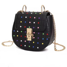 multicoloured studded bag black bag edgability angle view