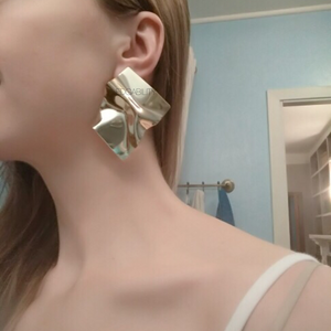 gold earrings statement jewelry edgability model view