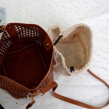 brown handbag bucket bag edgability top view