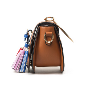 studded bag brown bag with tassels edgability side view