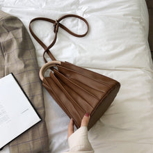 pleated bucket bag brown bag edgability top view