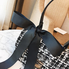 black and white tweed bag sling bag with bow edgability detail view