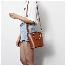 brown bucket bag with ring handle edgability model view