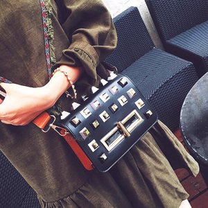 black bag studded bag with multicoloured rivets edgability model view