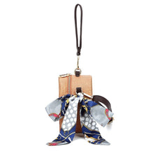 rattan bag box bag round bag wristlet with scarf edgability side view